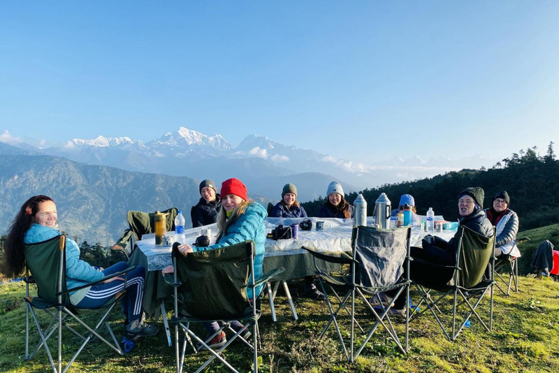 Outdoor breakfast during camping trek in the Everest Region with a beautiful nature and mountain panoramic view
